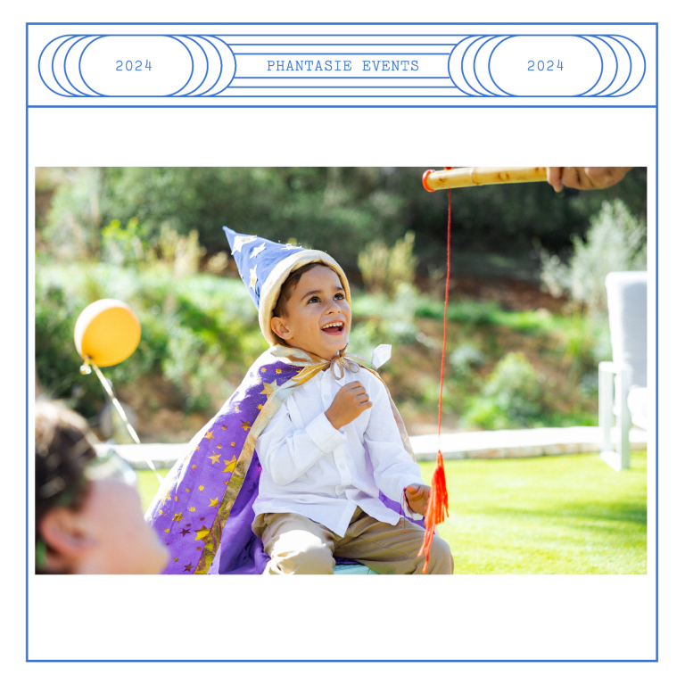 Child dressed as a wizard enjoying a party game